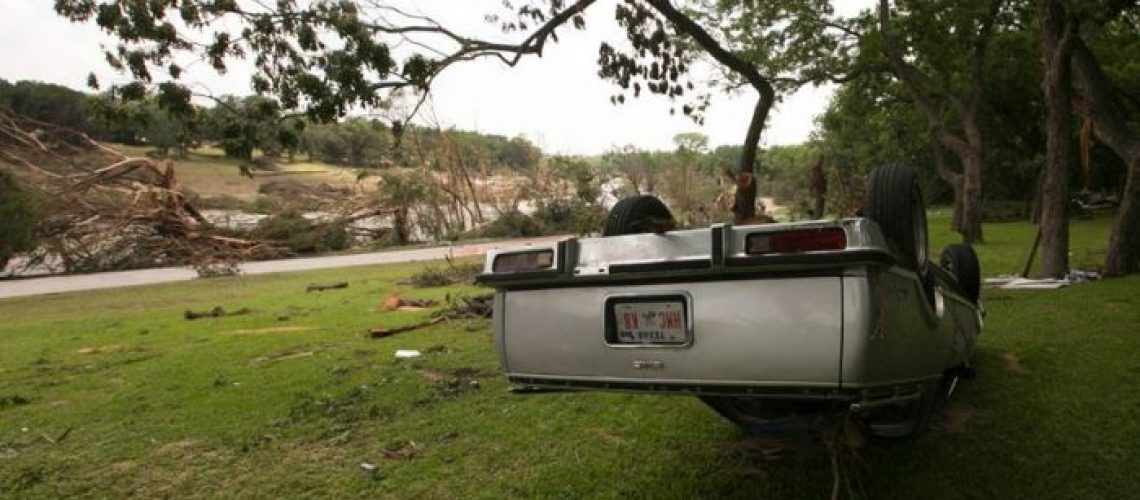 An overturned vehicle on the banks of the Blanco River on May 26, 2015. The area saw record-breaking flood levels two days before.  Picture: Marjorie Kamys Cotera